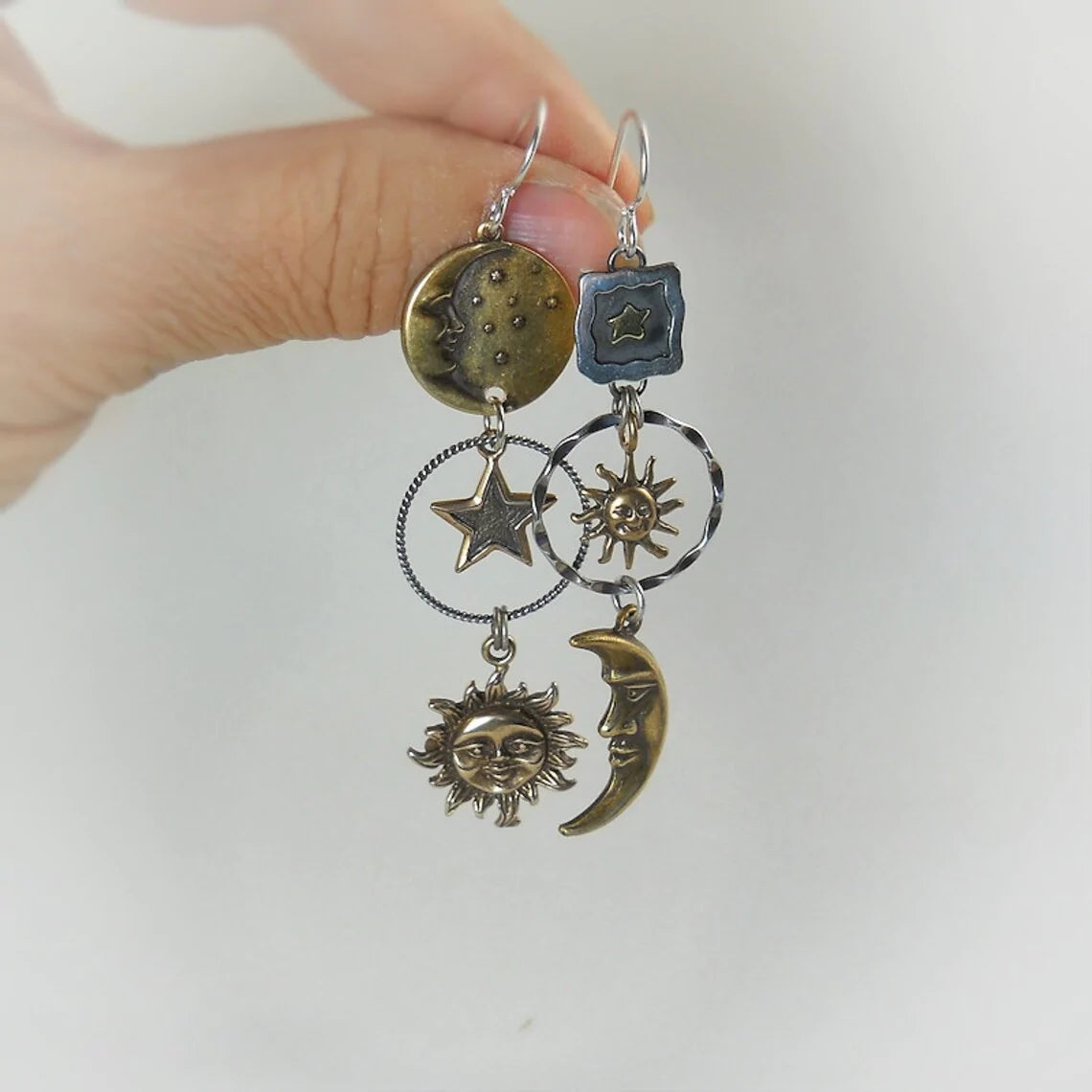 Sun and moon pendant earrings