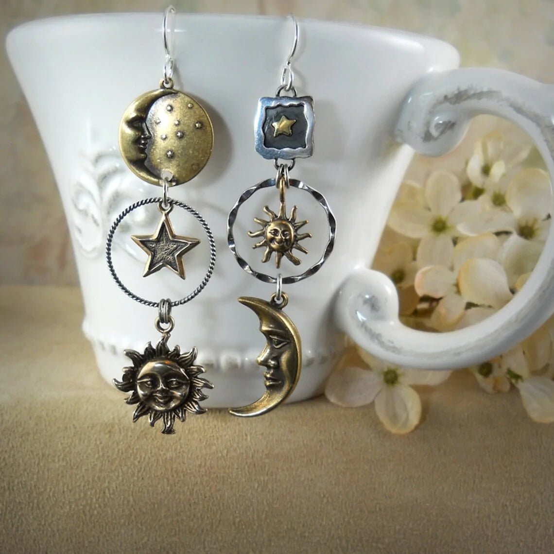 Sun and moon pendant earrings