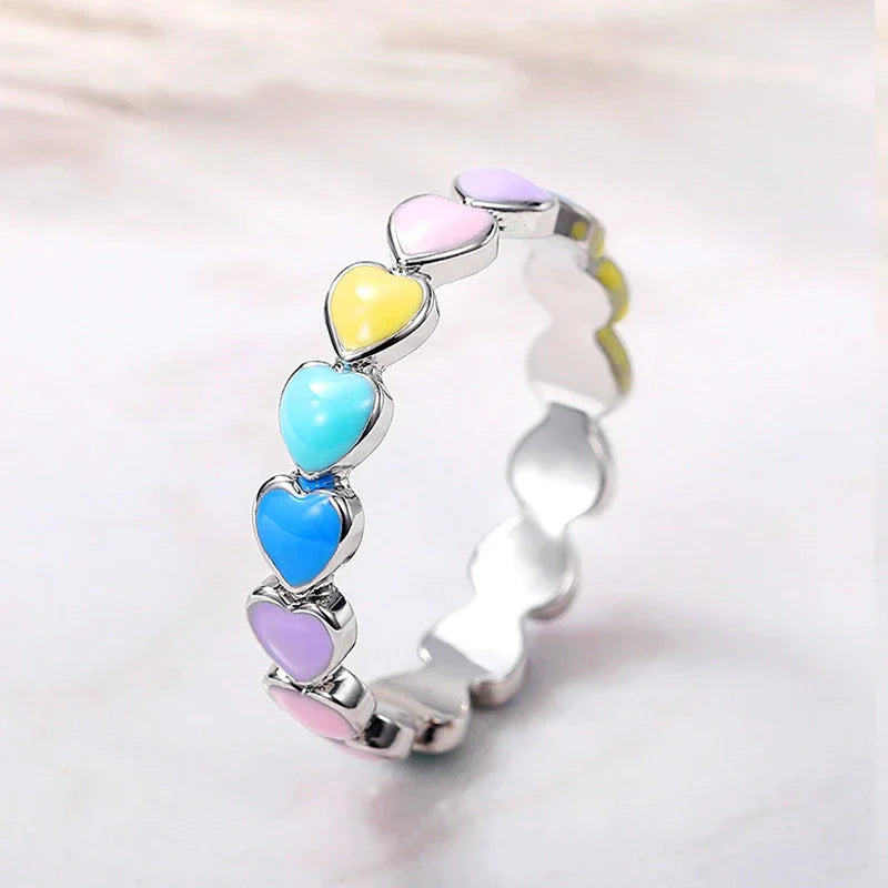 Vibrant rainbow hearts ring