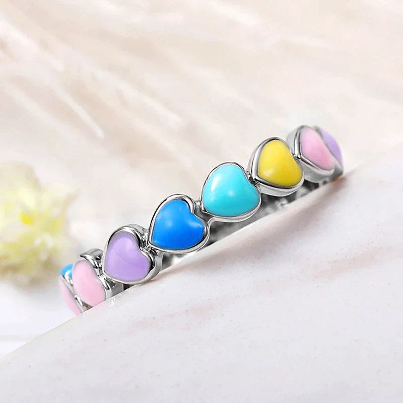 Vibrant rainbow hearts ring