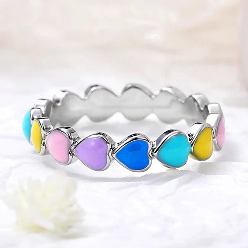Vibrant rainbow hearts ring