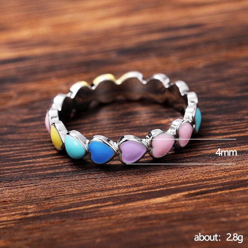 Vibrant rainbow hearts ring
