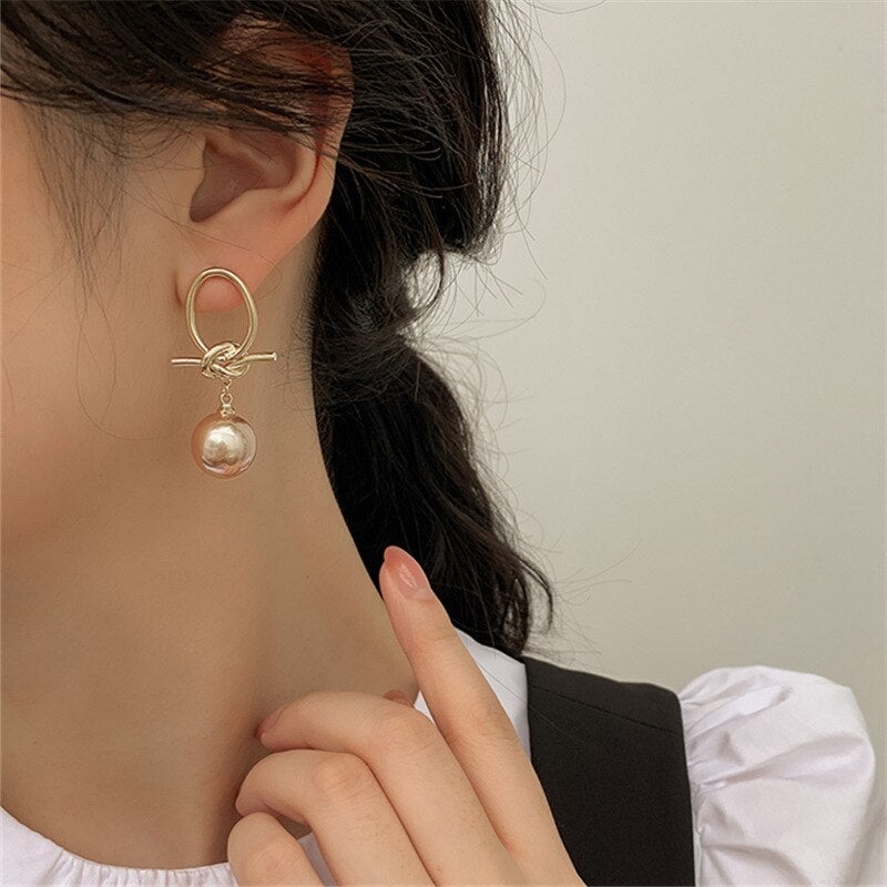 Timeless pearl bow earrings