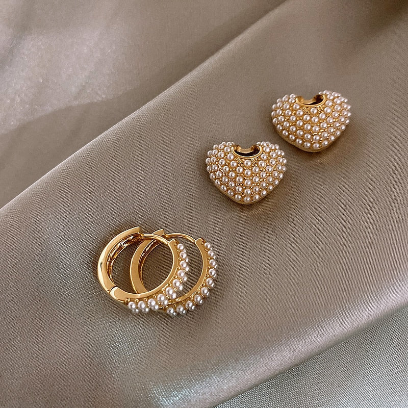 Radiant pearl love earrings