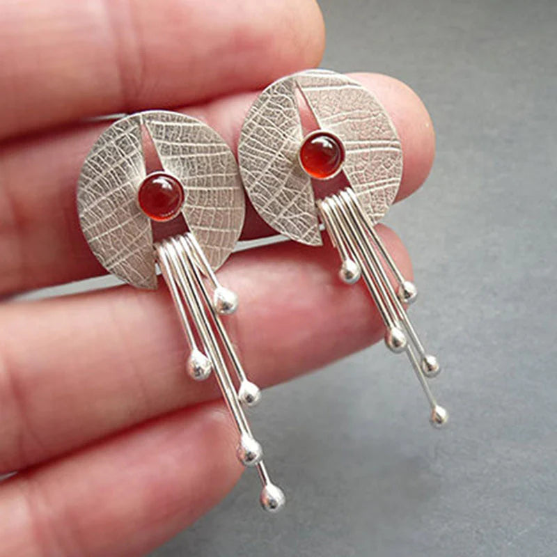 Red hollow stone drop earrings