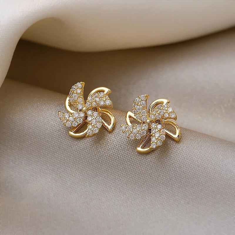 Pinwheel earrings with zirconia