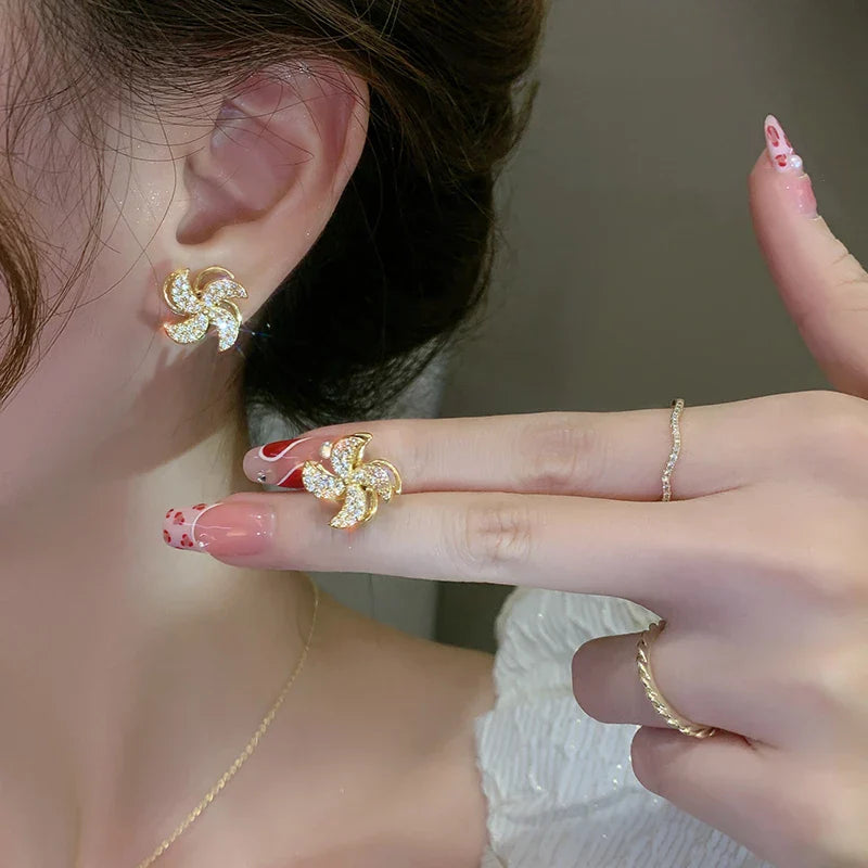Pinwheel earrings with zirconia