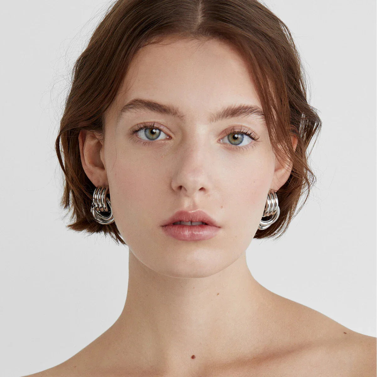 Maka - chunky double hoop stainless steel stud earrings