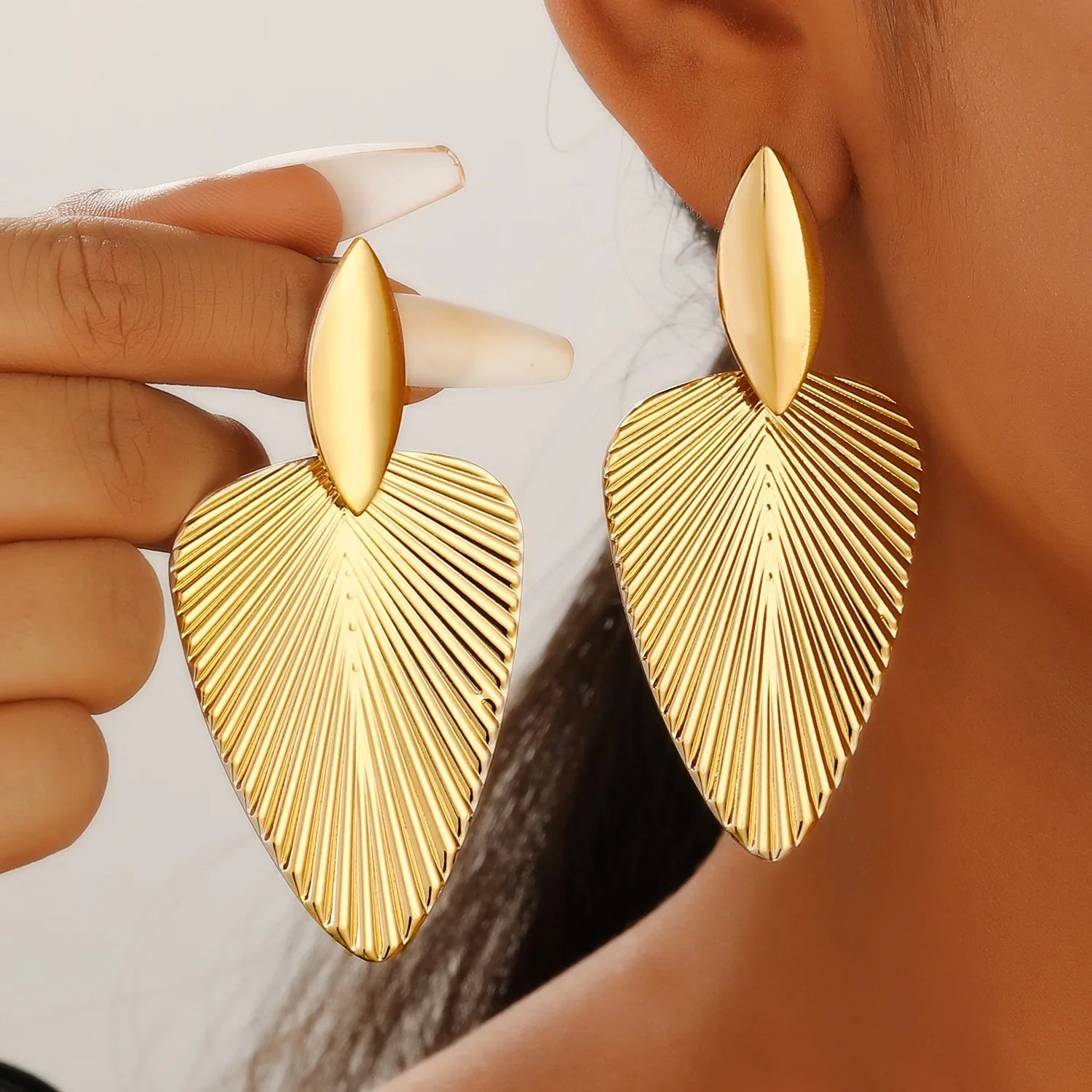 Textured leaf drop earrings