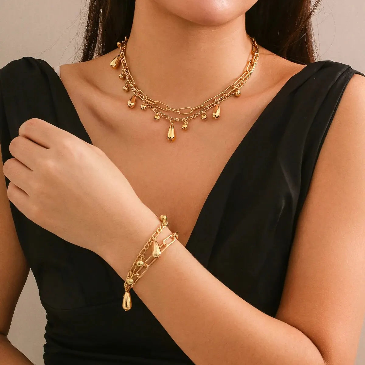 Leirma - multilayer water drop tassel necklace