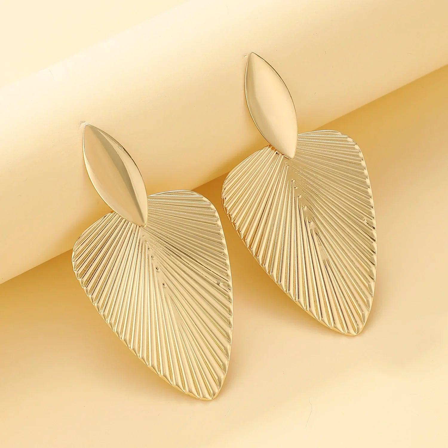 Textured leaf drop earrings