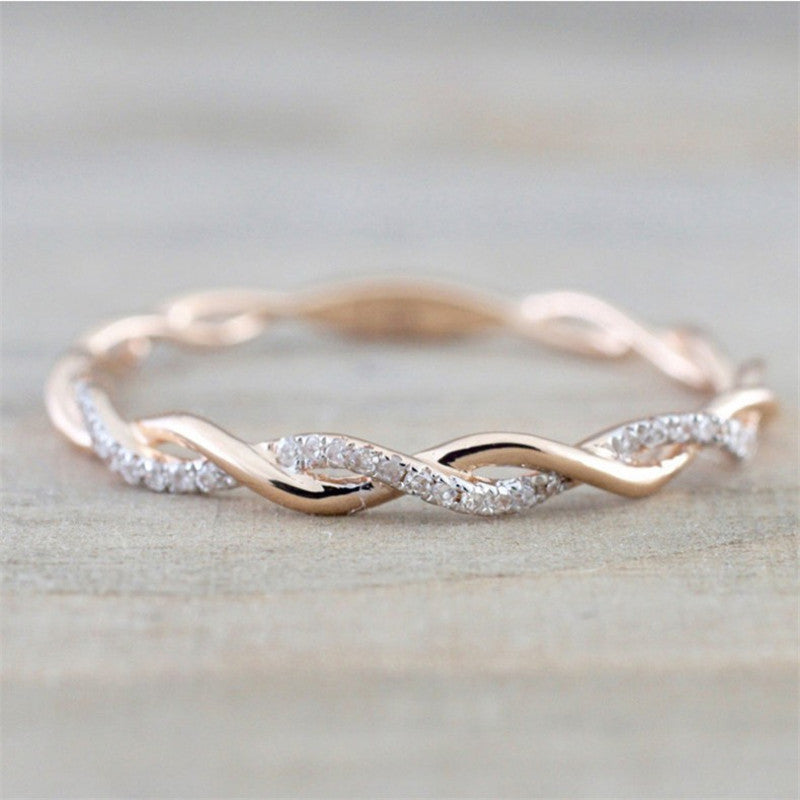 Women's Twisted Band Ring – Elegant Interwoven Design with Sparkling Zirconia