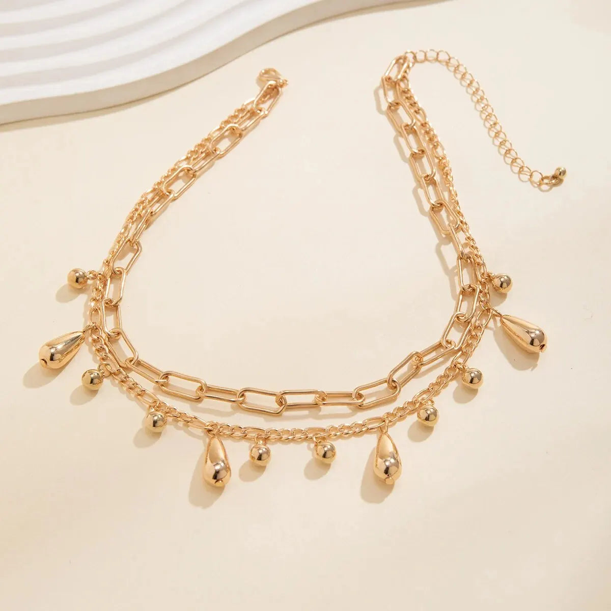 Leirma - multilayer water drop tassel necklace