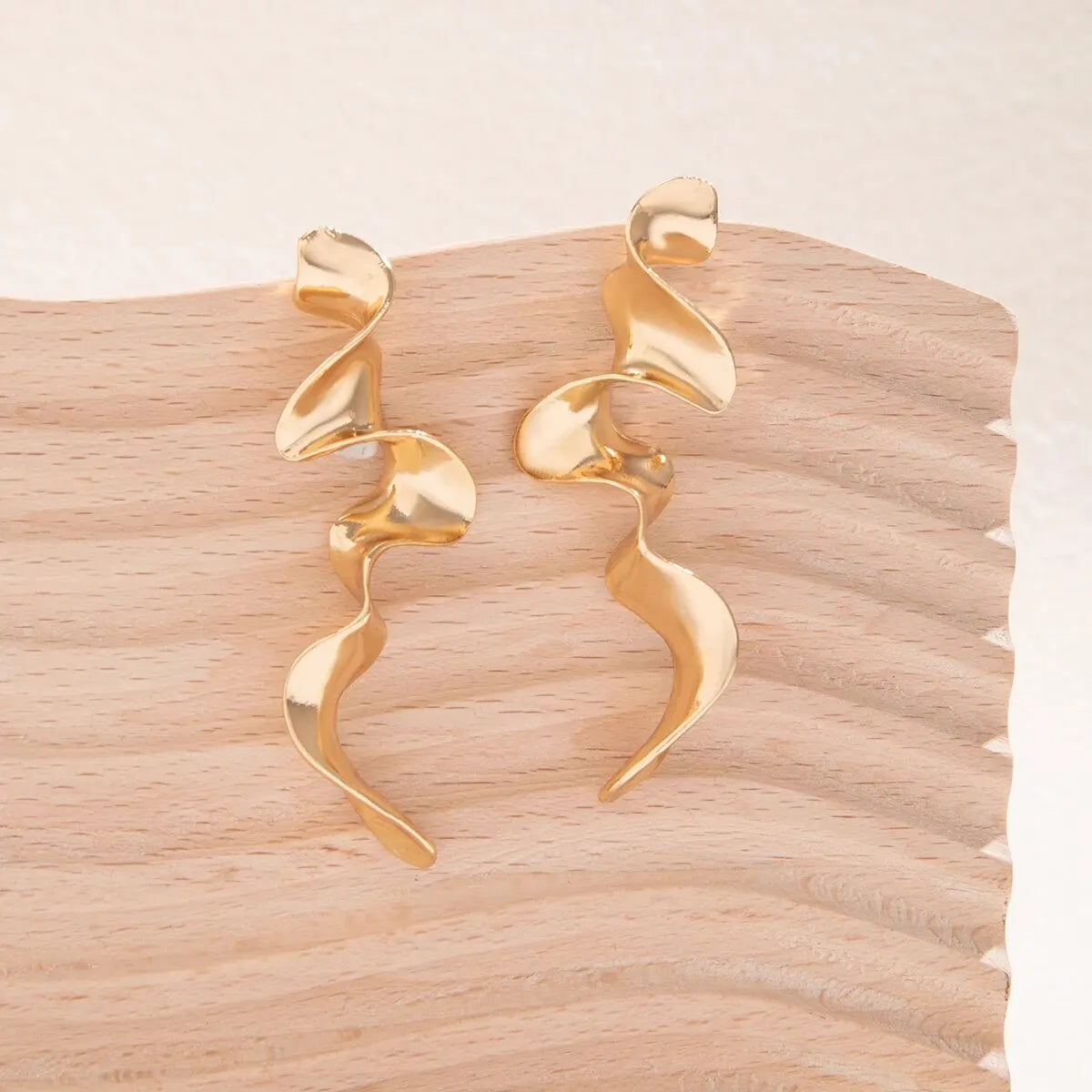 Stylish statement spiral drop earrings