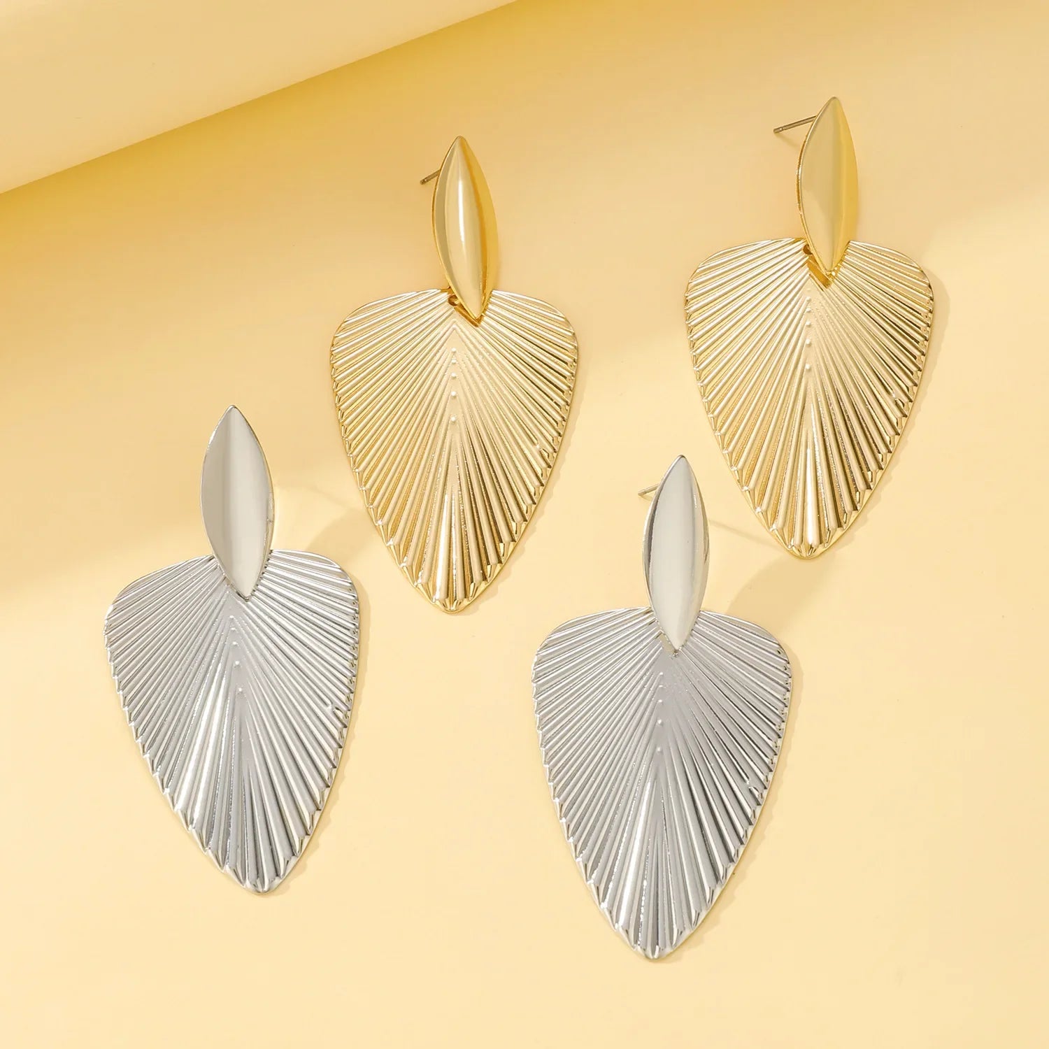 Textured leaf drop earrings