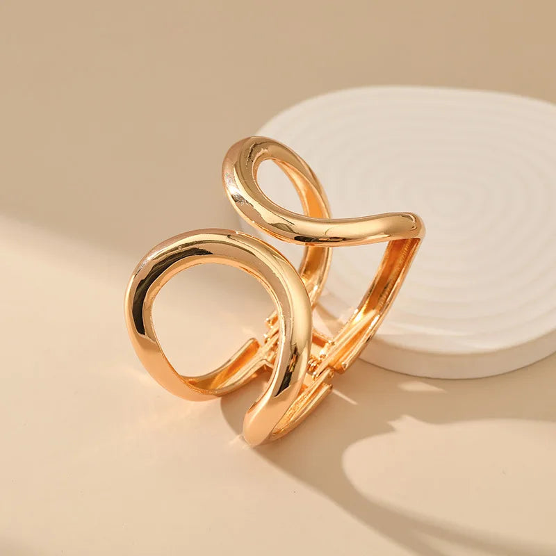 Niccita - unique metal cut-out open bracelet