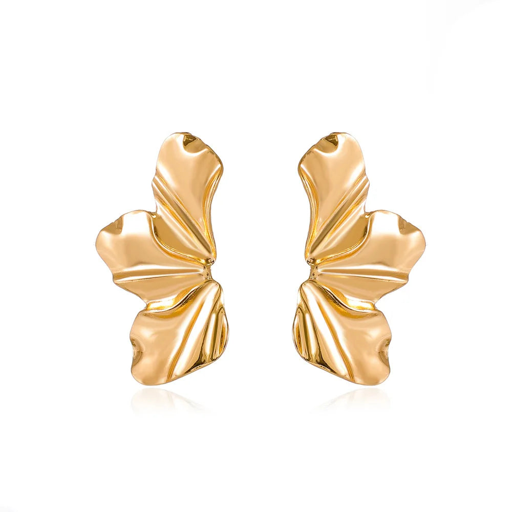 Women's metallic flower-shaped statement earrings