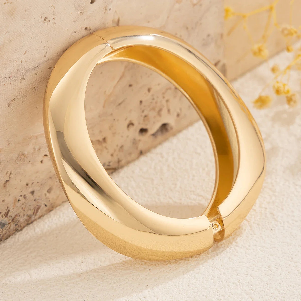Women's chunky polished metal cuff bracelets