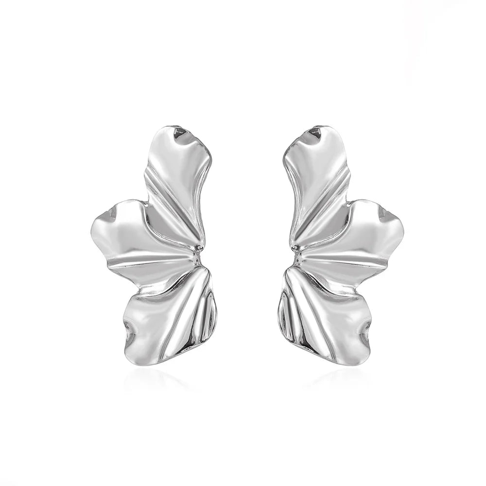 Women's metallic flower-shaped statement earrings