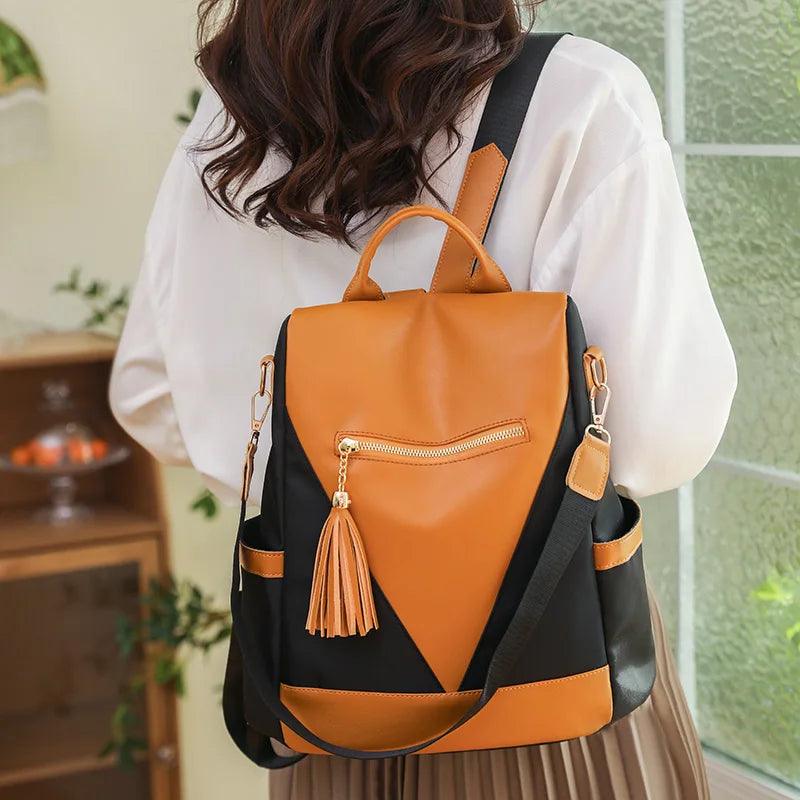 Valentina - two-tone backpack with tassel charm